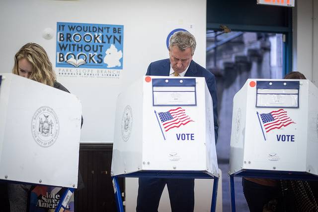 Mayor Bill de Blasio and First Lady Chirlane McCray vote in the 2018 general election at the Park Slope Library in Brooklyn on Tuesday, November 6th, 2018.